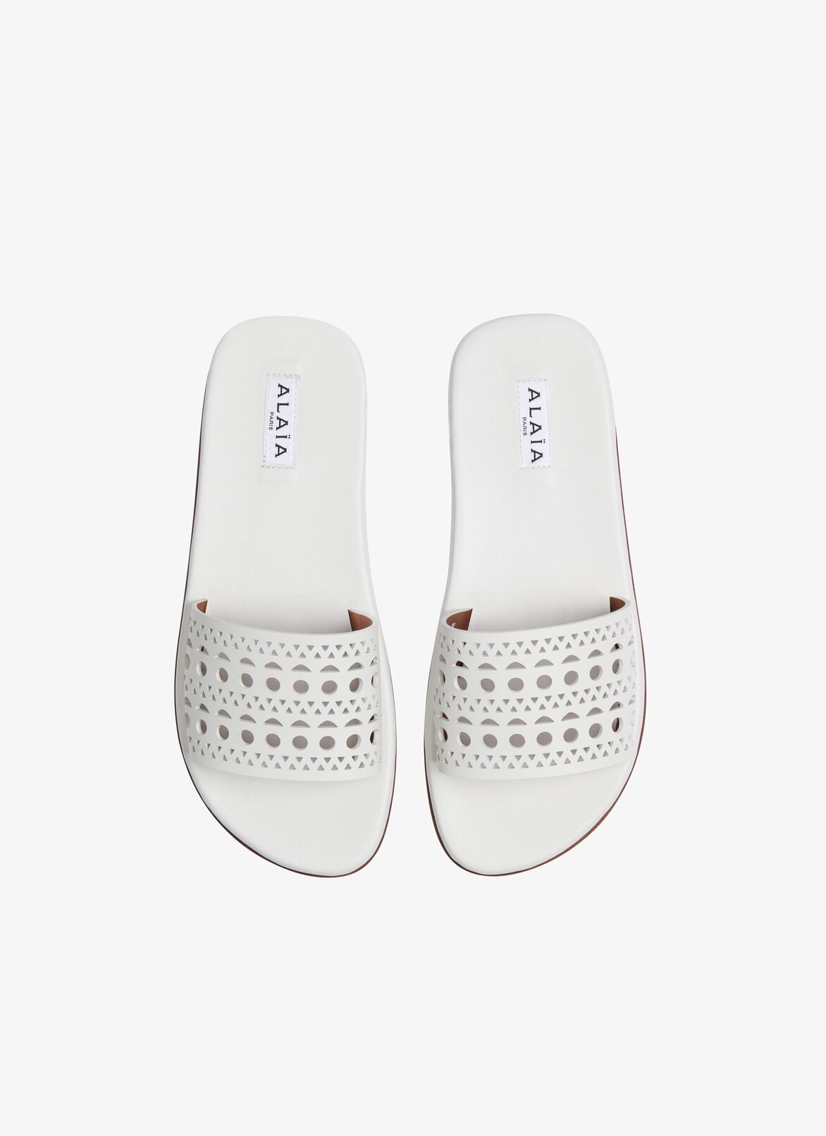 MULES IN VIENNE CALFSKIN ALAÏA WHITE MULES IN VIENNE CALFSKIN